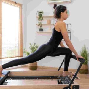 how does a pilates machine work